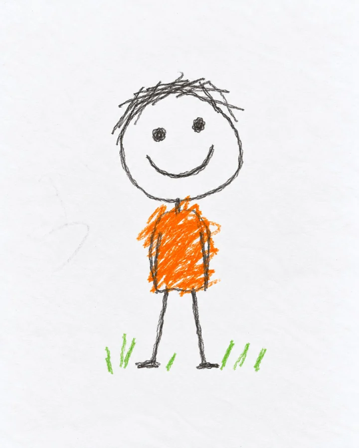 Drawing: A simple pencil stick figure with scribbly hair and an orange crayon shirt